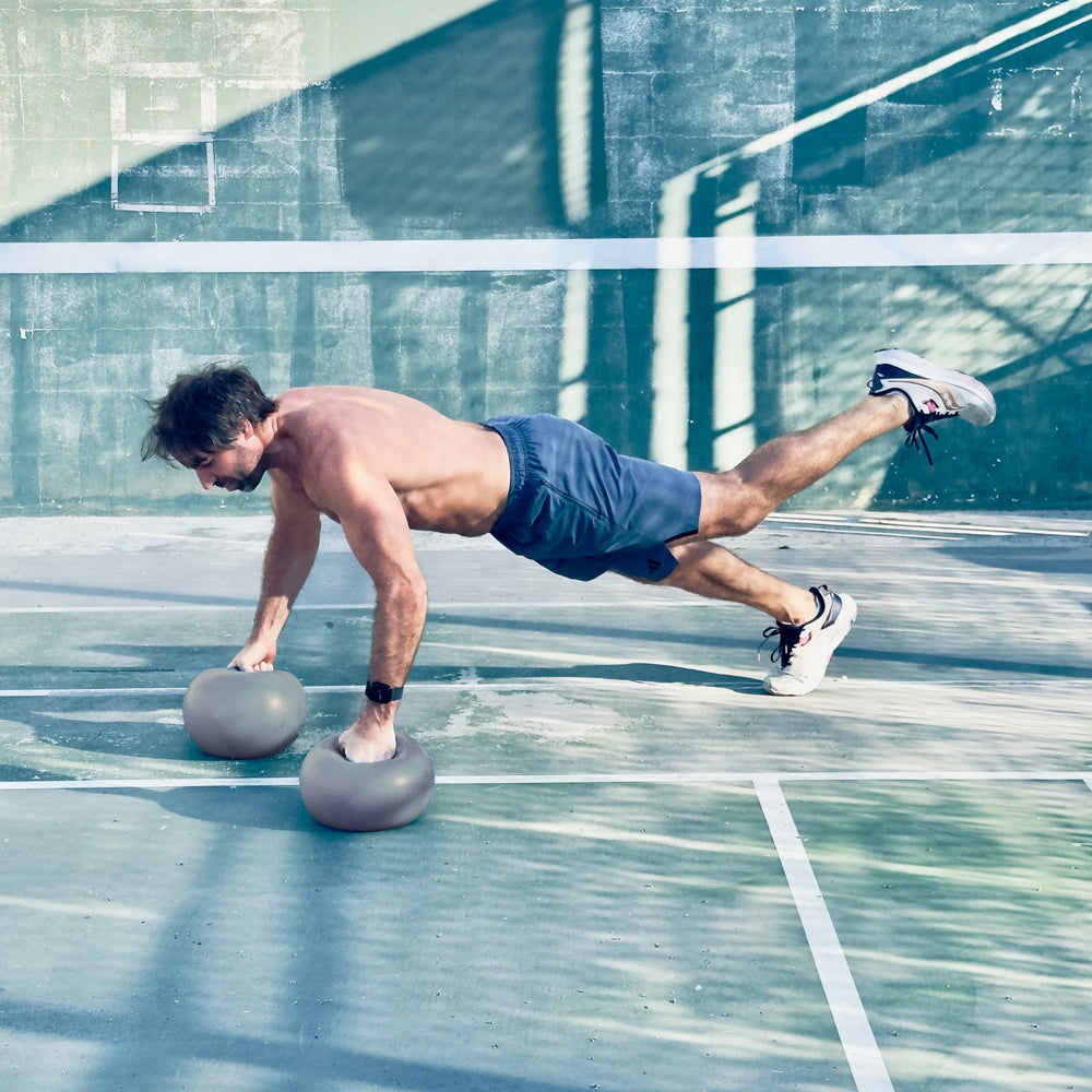 Push-ups with both hands on Logic balls